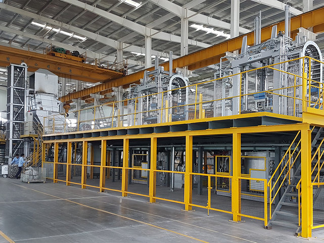 Gießlinie mit Bühne, Warmhalte- und Entgasungsstation Gießlinie zur Produktion von Strukturteilen
